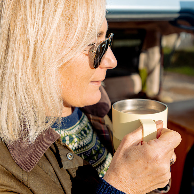 12oz-rise-mug-q4 12oz_rise_coffee_mug_wax_yellow_woman_drink_closeup_square.jpg