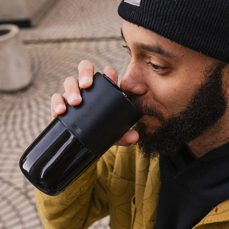 daily-on-the-go-set-k2 16oz_rise_tumbler_black_man_drink_square.jpg