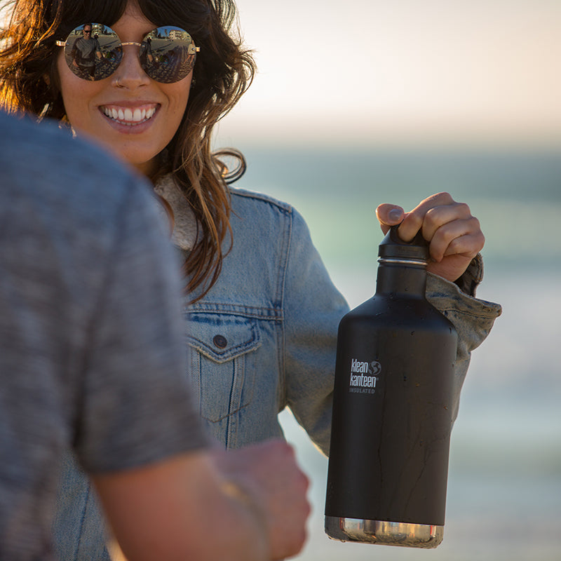 64oz-classic-with-loop-cap-z0 64oz_insulated_classic_black_beach_girl_hand_square.jpg