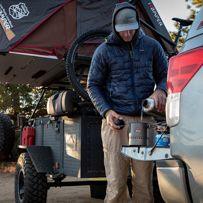 64oz-wide-with-loop-cap-i3 64oz_wide_mouth_bottle_camping_pour_square.jpg