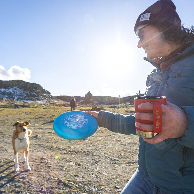 12oz-camp-mug-m6 insulated_camp_mug_12oz_woman_dog_frisbee_square.jpg