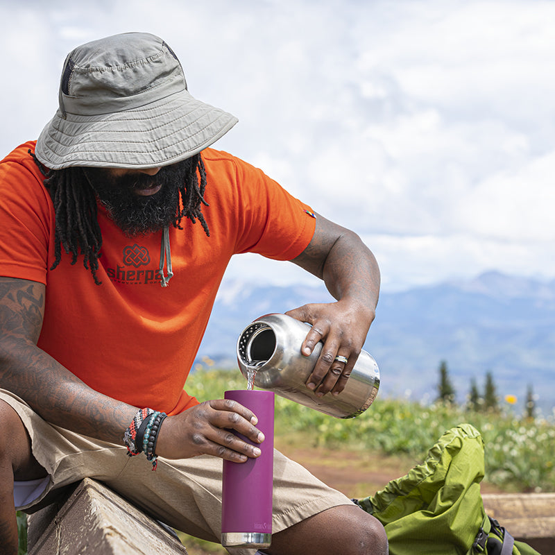 64oz-tkwide-with-loop-cap-p8 tkwide_64oz_bottle_backpacker_mountains_filling_square.jpg